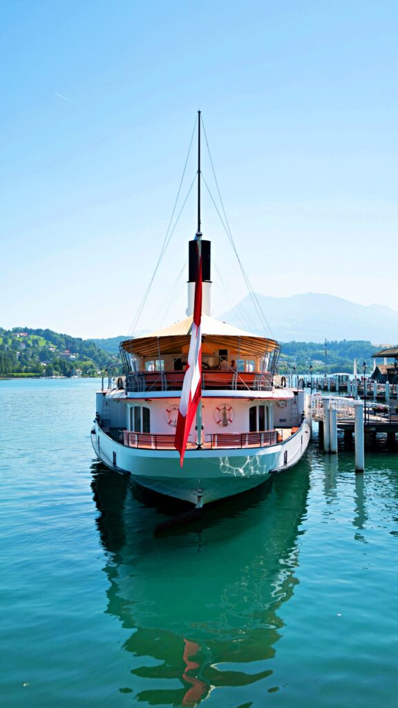 Lucerne travel: enjoying a private boat ride on emerald waters